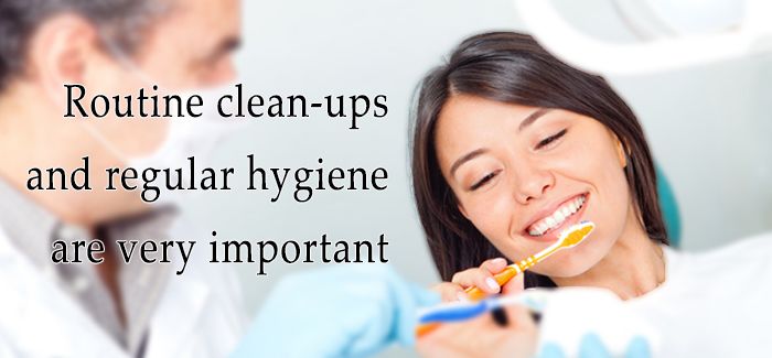 A photograph of a woman with a dentist with the text